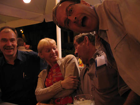 Andris, his wife, Peter & Guntars at bar in square 